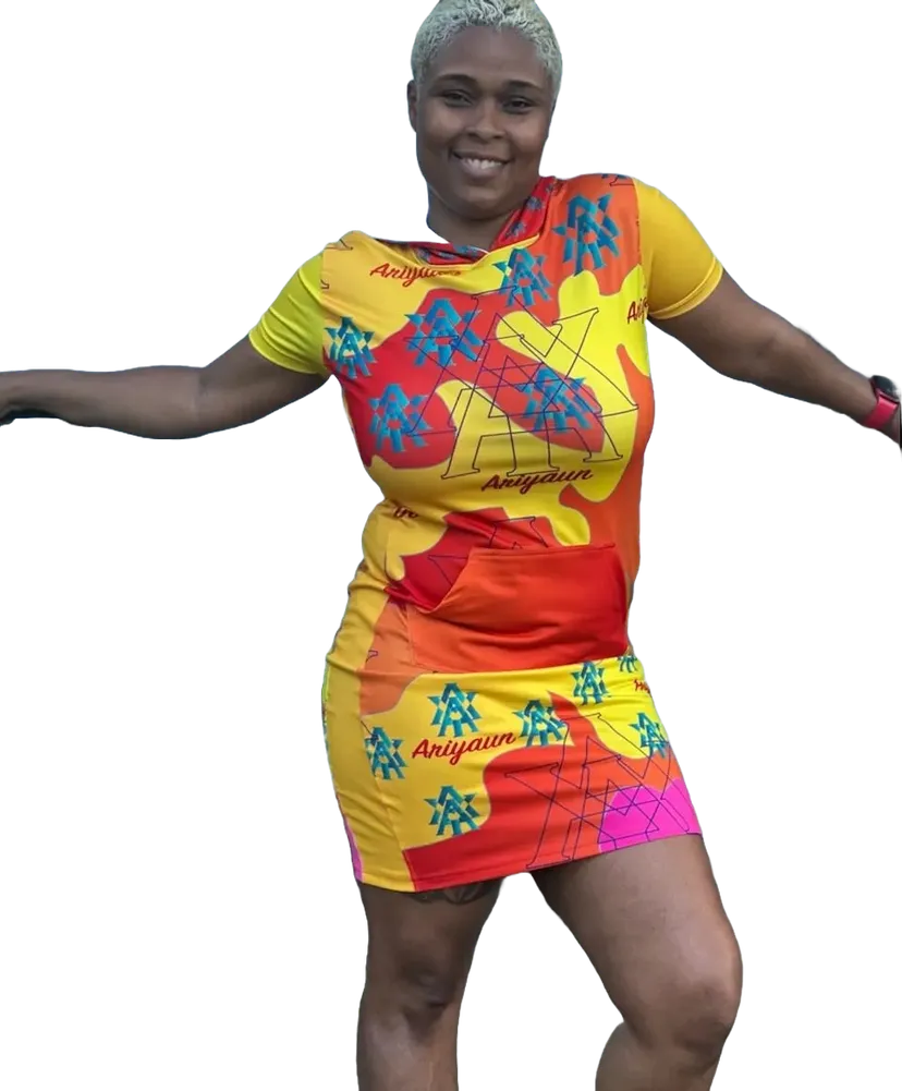 Bianca Stewart in a colorful Ariyaun print dress