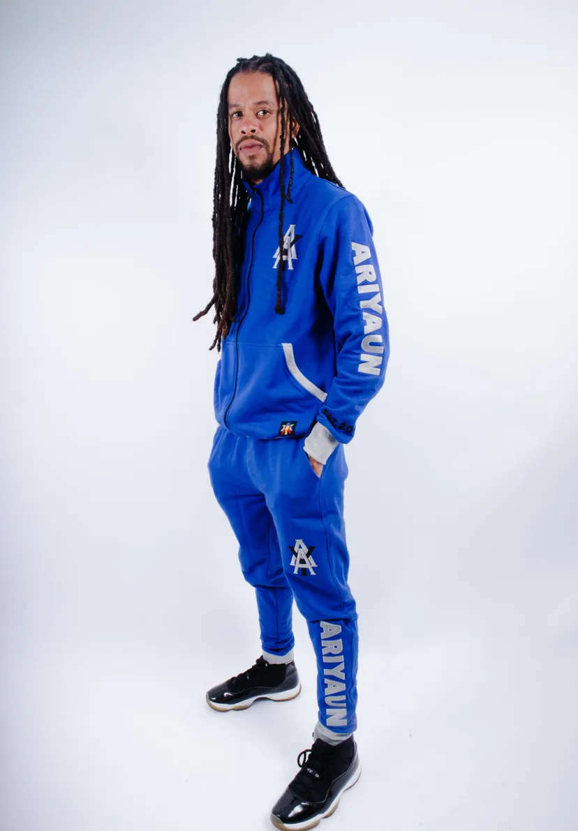 Man in royal blue Ariyaun tracksuit