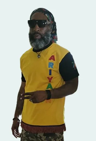 Man in a yellow Ariyaun sleeveless top